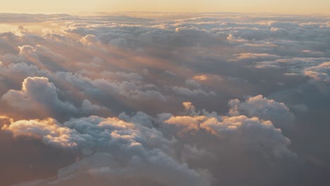Aerial-View-of-Puffy-Golden-Clouds-Slow-Motion