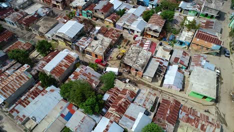 Aerial-view-above-a-buildings,-in-ghetto-district-Favela,-Rio-de-Janeiro,-Brazil,-South-America---orbit,-drone-shot