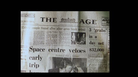 Extra-extra-spinning-newspaper-editorial-about-Apollo-twelve,-nineteen-sixty-nine,-the-age