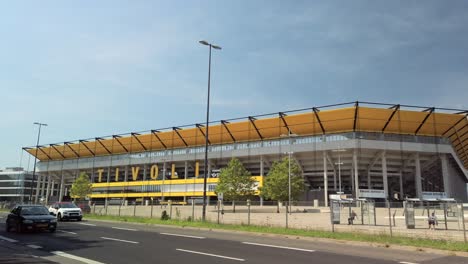 The-Tivoli-football-stadium,-located-in-the-German-City-of-Aachen-with-a-pedestrian-bridge-over-Krefelder-street