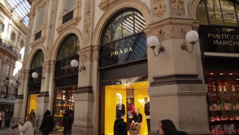 Prada-store-front-inside-Galleria-Vittorio-Emanuele-II,-wide-arc-shot-inside-during-daytime