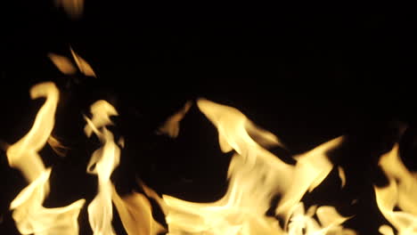 Slow-motion-of-flames-coming-off-a-fire-at-night-time