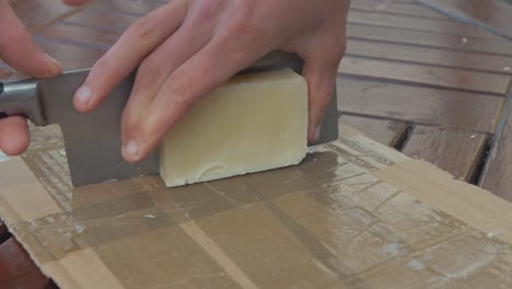 Cutting-homemade-olive-oil---coconut-bar-soap-into-bars