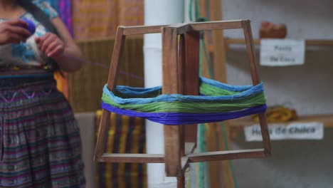 Guatemalan-Woman-Demonstrates-How-to-Roll-Yarn-into-Ball
