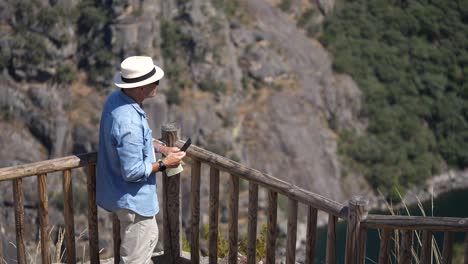 Tourist-taking-in-the-view-of-the-Ribeira-Sacra-in-Spain,-still-shot