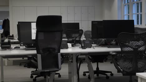 View-Of-Empty-Desks-And-Chairs-In-Office-Building-During-Lockdown