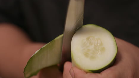 Peeling-The-Fresh-Cucumber-With-A-Chef's-Knife-For-Sushi-Roll