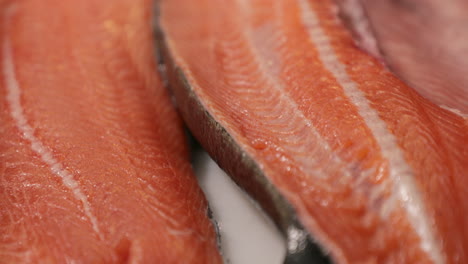 Fresh-Salmon-Meat-Prepared-For-Sushi-In-A-Japanese-Restaurant-Kitchen---macro