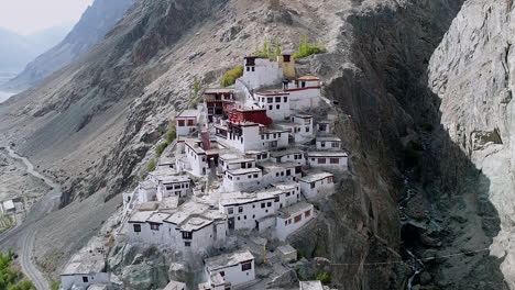 ancient-buddhist-monastery-on-a-beautiful-and-remote,-rocky-mountain-landscape