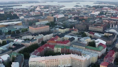 Aerial-pan-of-Helsinki-Finland-colorful-buildings-city-from-above