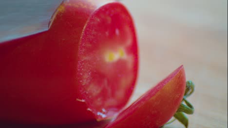 Cutting-Tomato-on-Slices-With-Knife,-Close-Up