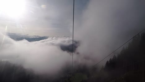With-a-cable-car-up-through-the-clouds-where-the-sun-shines