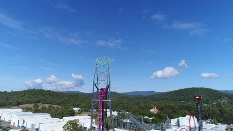 Aerial-view-of-The-Jocker-Rollercoaster-ride-at-an-empty-Warner-Bros-Movie-World-Theme-Park-on-the-Gold-Coast-Australia-during-the-Coronavirus-Lockdown