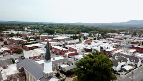 Church-in-Morganton-NC,-Morganton-North-Carolina-in-Foreground-Aerial