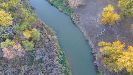 A-drone-down-shot-of-the-river-ecosystem-along-the-Platte-river-in-fall