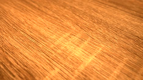 Golden-wood-floor-close-shot-in-slow-motion,-4k