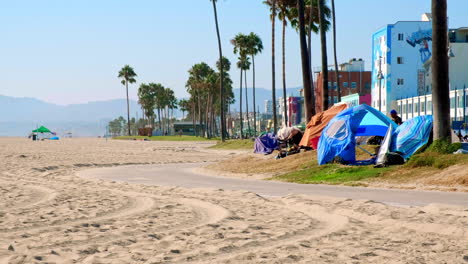 Daytime-in-Venice,-California--Urban-Beach-Boardwalk-with-Homeless-Tents-on-Curb