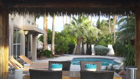 Tropical-Cabana-by-Outdoor-Swimming-Pool-in-Luxury-Vacation-Home-Backyard