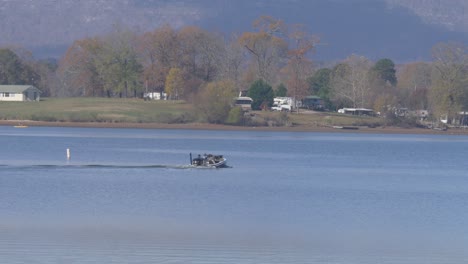 fishing-boat-on-lake-turning-slow-motion.mp4