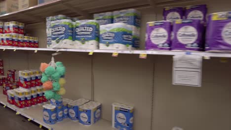 The-camera-pans-down-the-toilet-paper-aisle-in-the-grocery-store