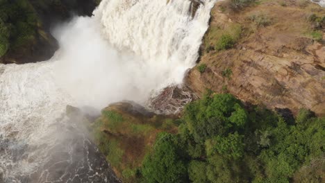 Aerial-zenith-drone-shot-of-a-waterfall-in-the-nature