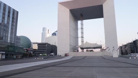 Geat-Arch-of-La-Defense-and-Plaza-empty-during-earl-morning-in-lockdown-due-to-coronavirus-outbreak