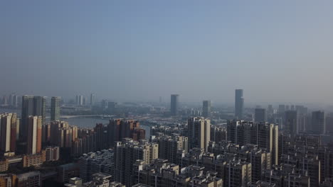 Aerial-shot-of-living-buildings-block-of-Liede-Village-in-Guangzhou,-China-on-a-sunny-day-in-the-afternoon