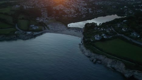 Aerial-fly-out-of-Swanpool-beach-and-coast-Falmouth-Cornwall-England-UK