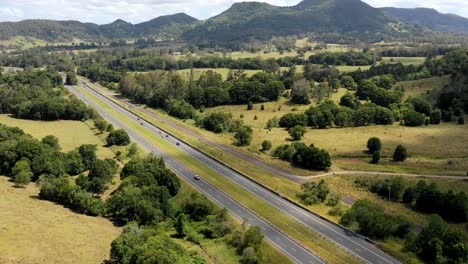 Hyperlapse-aerial-of-Bruce-Highway-M1---a-rural-motorway-on-the-Sunshine-Coast,-Queensland,-Australia