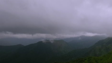 Motion-Lapse-of-storm-clouds-moving-fast-on-top-of-the-mountain-in-Vagamon,-Kerala,-India