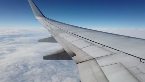 View-of-a-Plane-wing-high-up-in-the-sky