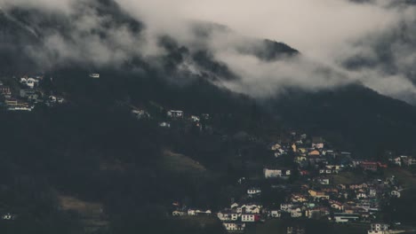 Alpine-Village-With-Low-Fog-Clouds-Timelapse