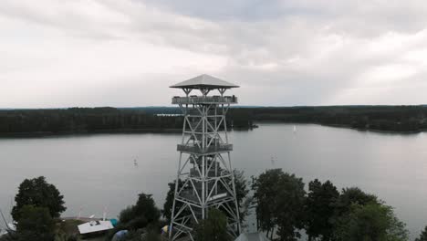 Aerial-shot-of-Wdzydzki-Park-Krajobrazowy-in-Kaszuby,-Poland-with-view-of-observation-tower-in-Wdzydze-Kiszewskie