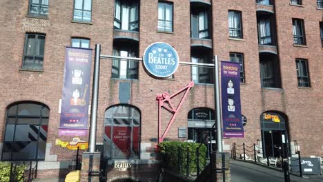 The-Beatles-Story-museum-on-Albert-Dock-in-Liverpool,-Uk,-which-tells-the-story-of-famous-band,-The-Beatles-and-their-rise-to-fame-in-the-1960's