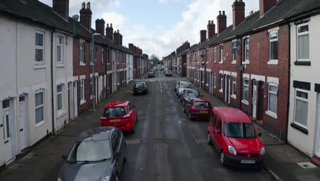 Aerial-footage-of-Oldfield-Street-in-one-of-Stoke-on-Trents-poorer-areas,-Terrace-housing,-poverty-and-urban-decline,-immigration-housing