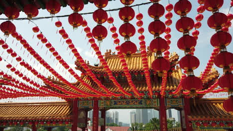 Slow-Motion-Shot,-Colourful-Chinese-paper-lanterns-hanging-in-the-courtyard-of-Thean-Hou-Temple,-Kuala-Lumpur,-Malaysia