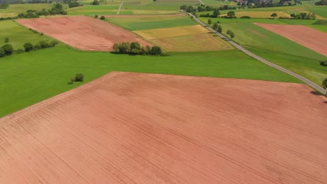 flying-over-colorful-fields-and-roads