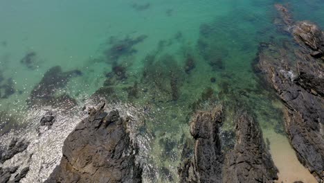 Drone-footage-of-beautiful-beach-and-clear-turquoise-water