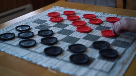 Closeup-shot-of-a-game-of-Checkers-with-soft-focus,-a-strategic-intellectual-game
