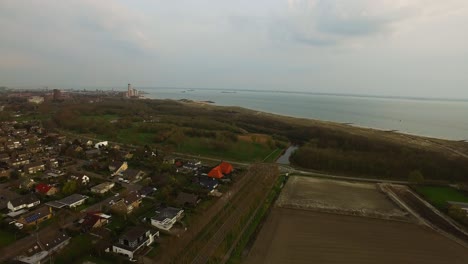 Aerial:-The-city-of-Vlissingen-located-at-the-North-sea-during-sunset