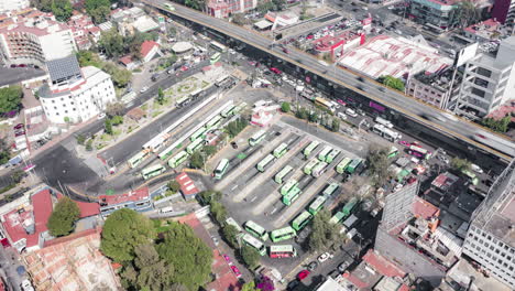 Aerial-orbit-hyeprlapse-of-the-big-bus-stop-of-Mixcoac-in-Mexico-City