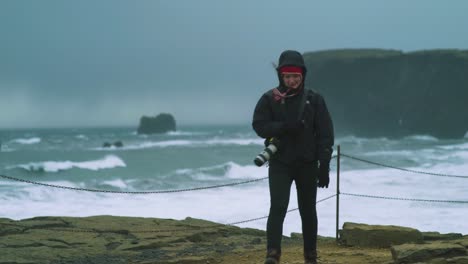 Woman-in-Icelandic-weather-storm,-strong-wind