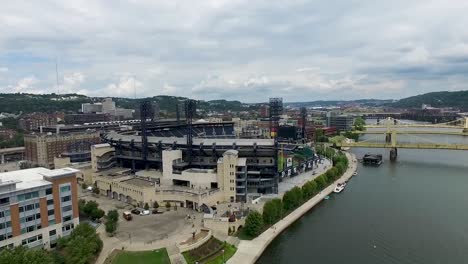Aerial-of-the-backside-of-the-PNC-Park-baseball-stadium-of-the-Pittsburgh-Pirates-Pittsburgh,-Pennsylvania-Concept:-urban,-cityscape,-sporting,-fields,-drone