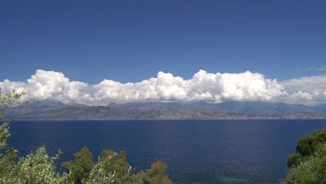 Smooth-panning-shot-of-the-Albanian-coast-taken-from-Kassiopi,-Corfu,-Greece