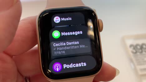HD-video-of-a-woman's-hand-scrolling-through-the-newest-Apple-Watch-Series-4