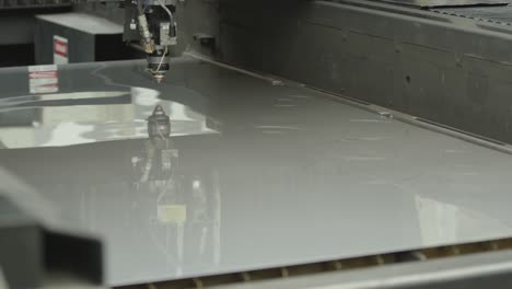 Laser-cutter-cutting-metal-plates