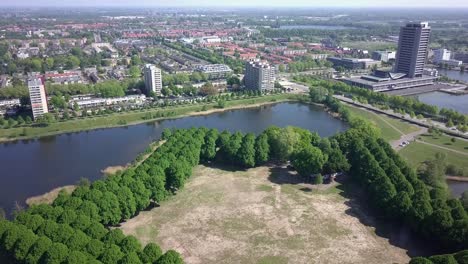 Aerial-footage-of-flying-over-the-star-shape-city-park-in-Europe-Holland-and-facing-to-the-city-in-4K