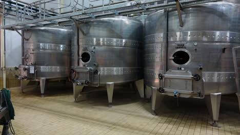 Stainless-steel-tanks-for-the-maturation-of-wine-in-wine-cellar