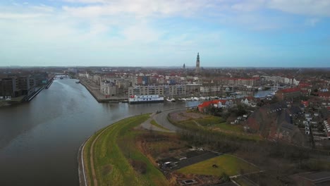 The-historical-city-of-Middelburg-with-in-the-foreground-a-canal-and-industrial-area