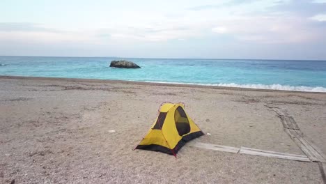 Camping-at-sunrise-on-a-beach-in-Albania-with-stunning-views-over-the-Adriatic-Sea-along-the-Albanian-Riviera
